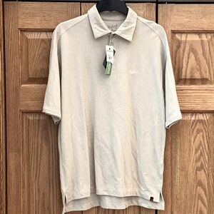 Woolrich tan/khaki Tidal Polo Shirt, size medium. Still has the tags